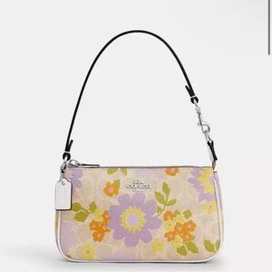 NWT Coach! Nolita 19
In Signature Canvas With Floral Print